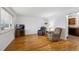 Comfortable living room with hardwood floors, offering a relaxed setting at 3261 Kassler Pl, Westminster, CO 80031