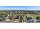 Expansive aerial view of a residential neighborhood with homes overlooking a lush green golf course at 26861 E Clifton Dr, Aurora, CO 80016