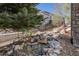 The backyard is enhanced with a stone waterfall at 26861 E Clifton Dr, Aurora, CO 80016