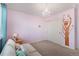 Bright bedroom with a whimsical butterfly theme and plenty of natural light at 26861 E Clifton Dr, Aurora, CO 80016