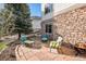 Enjoy a fire in the backyard on the stone patio at 26861 E Clifton Dr, Aurora, CO 80016
