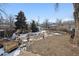 Spacious backyard featuring a gravel area and well-maintained landscaping at 2024 Ford St, Golden, CO 80401