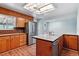 Kitchen showcasing wood cabinets, laminate countertops, and stainless steel appliances at 370 S Parfet St, Lakewood, CO 80226