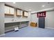 Room featuring built-in cabinets, countertop space, and a safe at 14100 Shasta Daisy St, Parker, CO 80134