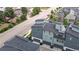 An aerial view showcases well-maintained townhomes, offering convenient parking and a modern design aesthetic at 6799 Navajo St, Denver, CO 80221