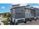 Modern townhomes feature attached garages, showcasing practical design and contemporary appeal at 6799 Navajo St, Denver, CO 80221