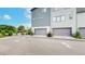 Attached garages offer convenient parking and storage, blending seamlessly with the modern home design at 6799 Navajo St, Denver, CO 80221