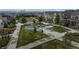 Outdoor recreation with a playground, picnic tables and lush landscaping. A community area for fun activities at 6799 Navajo St, Denver, CO 80221