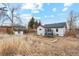 Spacious backyard featuring a trampoline and shed at 6420 W 6Th Ave, Lakewood, CO 80214