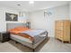 Cozy bedroom with neutral tones, providing a calming space with ample natural light and modern furnishings at 6420 W 6Th Ave, Lakewood, CO 80214