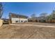 Large backyard behind house with new sod waiting to be planted at 6488 E 63Rd Pl, Commerce City, CO 80022
