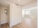 Spacious finished basement with new light-colored flooring and built in closets at 6488 E 63Rd Pl, Commerce City, CO 80022