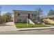 Inviting exterior with well-maintained landscaping and a long driveway at 6488 E 63Rd Pl, Commerce City, CO 80022
