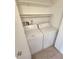 Laundry closet with side-by-side washer and dryer at 4400 S Quebec St # C107, Denver, CO 80237