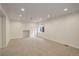 Unfinished basement featuring neutral carpet, recessed lighting, and a small window at 4605 S Yosemite St # 39, Denver, CO 80237