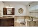 Elegant bathroom with soaking tub, glass shower, and granite vanity at 4605 S Yosemite St # 39, Denver, CO 80237