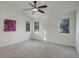 Spacious bedroom features a ceiling fan and ample natural light at 4605 S Yosemite St # 39, Denver, CO 80237