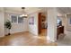 Elegant dining area with modern lighting, hardwood floors, and view of the kitchen at 4605 S Yosemite St # 39, Denver, CO 80237