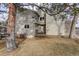 Charming home exterior with stone accents, wood siding, and a cozy front porch at 4605 S Yosemite St # 39, Denver, CO 80237