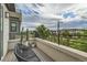 Private balcony with outdoor seating and views of the neighborhood at 6058 Beeler Ct, Denver, CO 80238