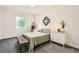 Bright bedroom with queen-sized bed and ladder at 6058 Beeler Ct, Denver, CO 80238