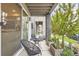 Inviting patio with stylish outdoor seating provides a relaxing space and natural light at 6058 Beeler Ct, Denver, CO 80238