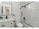Modern bathroom featuring sleek fixtures, a vanity, and a shower with glass door at 2616 W 134Th Cir, Broomfield, CO 80020