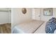 Comfortable bedroom featuring a bed with patterned pillows and a closet with storage at 2616 W 134Th Cir, Broomfield, CO 80020
