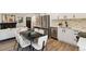 Elegant kitchen and dining area with stainless steel appliances and ample countertop space at 2616 W 134Th Cir, Broomfield, CO 80020