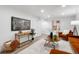 Inviting living room with contemporary furniture, a TV, and stylish accents at 2616 W 134Th Cir, Broomfield, CO 80020