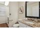 Neutral bathroom with granite countertop and vanity at 16164 E Hinsdale Ave, Aurora, CO 80016