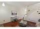 Bright living area with hardwood floors, a staircase, and tasteful decor at 16164 E Hinsdale Ave, Aurora, CO 80016
