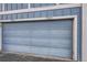 Garage with a gray door at 13343 E Louisiana Ave, Aurora, CO 80012