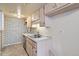 Clean kitchen with granite counters, stainless steel appliances, and white brick backsplash at 13343 E Louisiana Ave, Aurora, CO 80012