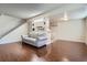 Inviting living room with wood floors, open floor plan, and staircase at 13343 E Louisiana Ave, Aurora, CO 80012