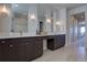 Modern bathroom with a double vanity and plenty of counter space at 10541 Leonardo Pl, Littleton, CO 80125