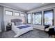 Comfortable bedroom with large windows and ample closet space at 10541 Leonardo Pl, Littleton, CO 80125