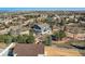 Breathtaking aerial view of a charming home nestled amongst mature trees in a quiet neighborhood at 14652 Beeler St, Brighton, CO 80602