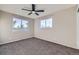 Bright bedroom featuring multiple windows that provide great light, and a ceiling fan at 14652 Beeler St, Brighton, CO 80602