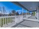 Open back deck offers a great space for entertaining or just relaxing, with great light and outdoor views at 14652 Beeler St, Brighton, CO 80602