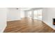 Living room featuring hardwood floors, a fireplace and sliding glass doors at 3315 S Monaco St # B, Denver, CO 80222