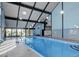 Indoor pool with high ceilings and large windows for natural light at 3315 S Monaco St # B, Denver, CO 80222