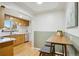 Charming kitchen with wood cabinets, white countertops and modern appliances at 5930 W 34Th Ave, Wheat Ridge, CO 80212