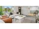 Spacious living room featuring stylish furniture and an open layout at 5930 W 34Th Ave, Wheat Ridge, CO 80212