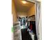 Walk-in closet featuring extensive shelving and hanging storage for organization at 7140 Simms St # 202, Arvada, CO 80004