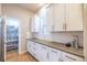 Well-organized pantry with custom shelving and ample storage space, conveniently located off the kitchen at 6682 Osage St, Denver, CO 80221