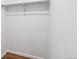 A walk-in closet with wood flooring and a metal clothes rack at 969 S Pearl St # 103, Denver, CO 80209