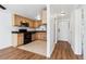 Efficient kitchen design featuring stainless steel appliances and wood cabinets at 969 S Pearl St # 103, Denver, CO 80209