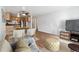 Inviting living space with open-concept design and a dining area, and modern decor at 969 S Pearl St # 103, Denver, CO 80209