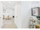 Bright hallway with modern decor and a stylish bar cart display at 3150 S Pennsylvania Street, Englewood, CO 80113